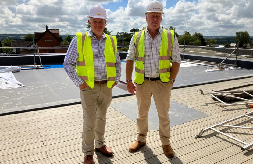 Nic on the auction house roof with Cllr Steve Bucknell.