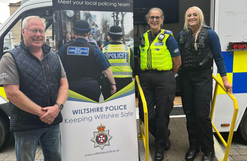 Nic with a Police Officer and PCSO outside the mobile police station.