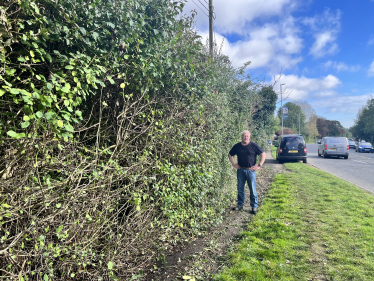 Nic alongside the cut hedge.