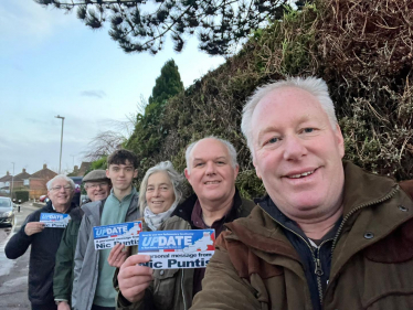 Nic with a team of supporters.